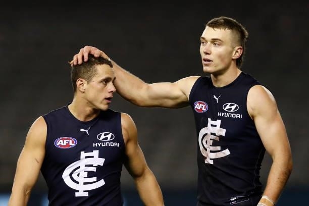 Patrick Cripps of the Blues acknowledges team mate Ed Curnow after the round 19 AFL match between Carlton Blues and North Melbourne Kangaroos s at...