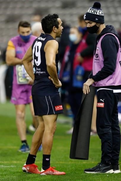 Eddie Betts of the Blues speaks with training staff after the round 19 AFL match between Carlton Blues and North Melbourne Kangaroos s at Marvel...