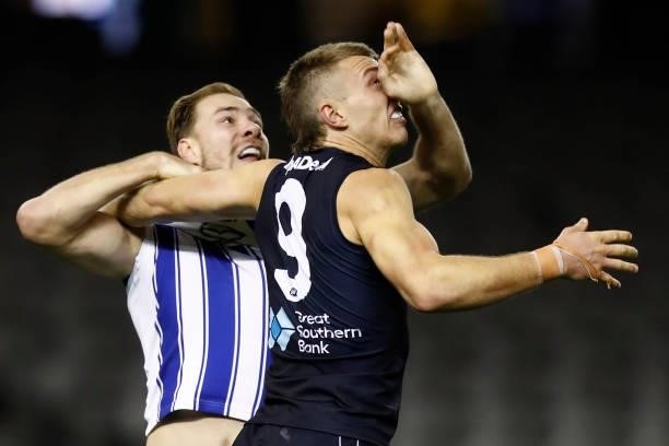 Benjamin McKay of the Kangaroos and Patrick Cripps of the Blues wrestle for position during the round 19 AFL match between Carlton Blues and North...