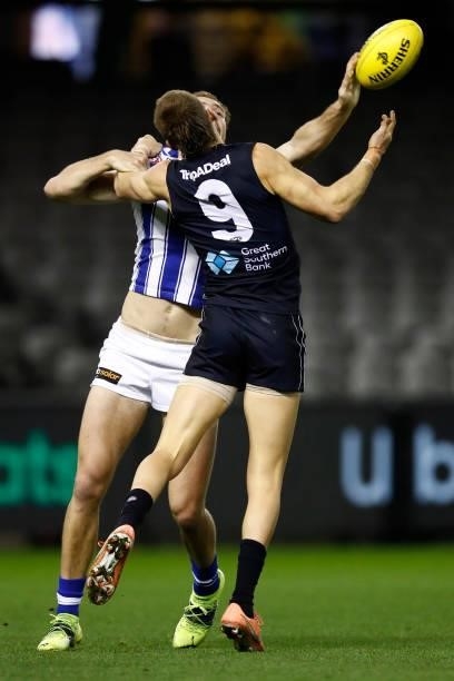 Benjamin McKay of the Kangaroos and Patrick Cripps of the Blues wrestle for position during the round 19 AFL match between Carlton Blues and North...