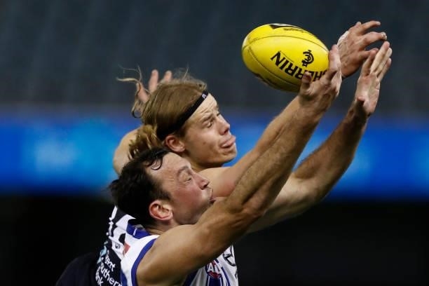 Todd Goldstein of the Kangaroos and Tom De Koning of the Blues compete during the round 19 AFL match between Carlton Blues and North Melbourne...