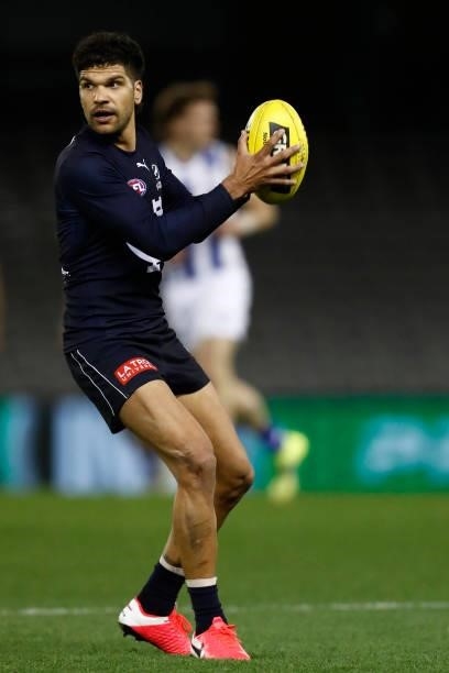 Sam Petrevski-Seton of the Blues gathers the ball during the round 19 AFL match between Carlton Blues and North Melbourne Kangaroos s at Marvel...