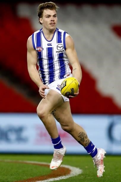 Cameron Zurhaar of the Kangaroos runs with the ball during the round 19 AFL match between Carlton Blues and North Melbourne Kangaroos s at Marvel...