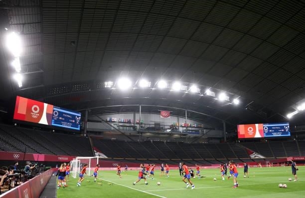 General view inside the stadium as Team Chile warm up prior to the Women's First Round Group E match between Chile and Canada on day one of the Tokyo...