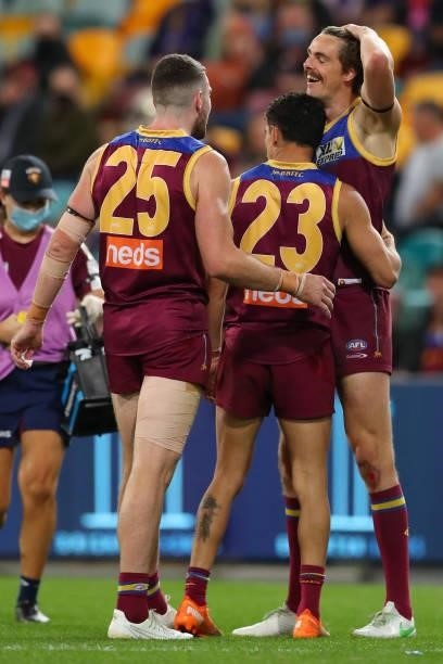 Joe Daniher of the Lions celebrates with Charlie Cameron of the Lions during the round 20 AFL match between Brisbane Lions and Gold Coast Suns at The...