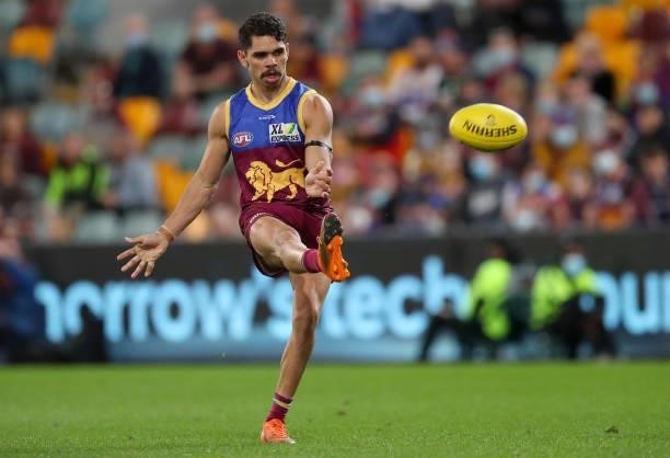 Charlie Cameron of the Lions kicks a goal during the round 20 AFL match between Brisbane Lions and Gold Coast Suns at The Gabba on July 24, 2021 in...
