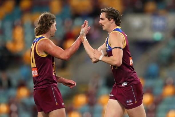Joe Daniher of the Lions celebrates his goal during the round 20 AFL match between Brisbane Lions and Gold Coast Suns at The Gabba on July 24, 2021...