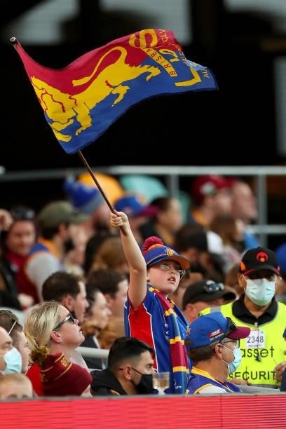 Lions fans show support during the round 20 AFL match between Brisbane Lions and Gold Coast Suns at The Gabba on July 24, 2021 in Brisbane, Australia.
