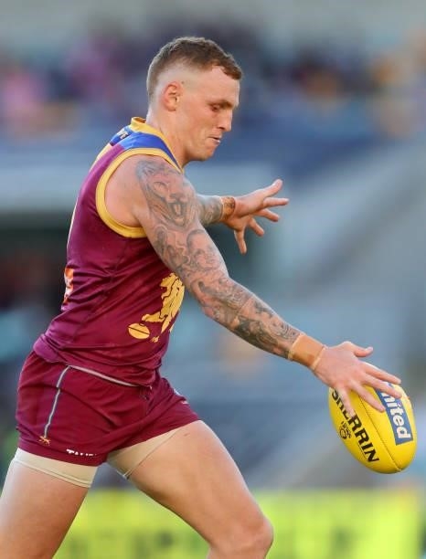 Mitch Robinson of the Lions kicks for goal during the round 20 AFL match between Brisbane Lions and Gold Coast Suns at The Gabba on July 24, 2021 in...
