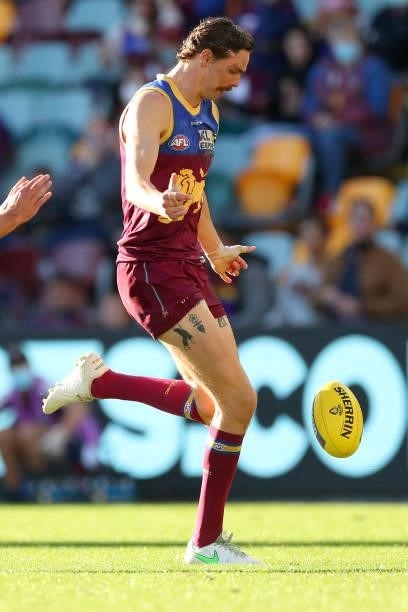Joe Daniher of the Lions kicks the ball during the round 20 AFL match between Brisbane Lions and Gold Coast Suns at The Gabba on July 24, 2021 in...