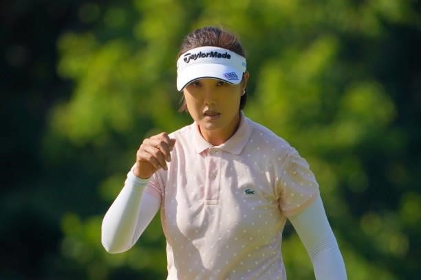 Mi-jeong Jeon of South Korea acknowledges fans after the birdie on the 11th green during the third round of Daito Kentaku eHeyanet Ladies at Takino...