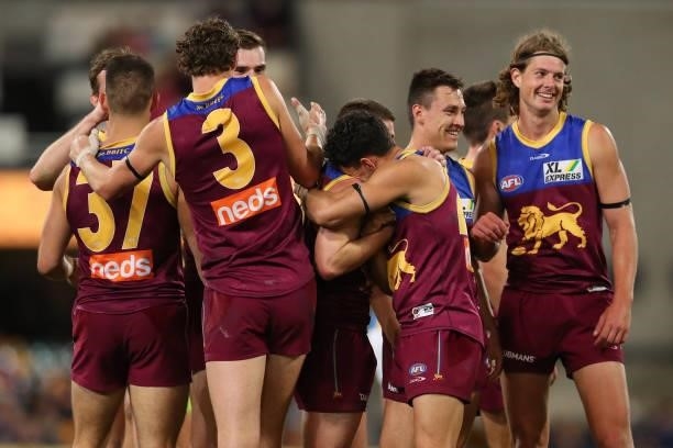 Joe Daniher of the Lions celebrates with team mates during the round 20 AFL match between Brisbane Lions and Gold Coast Suns at The Gabba on July 24,...