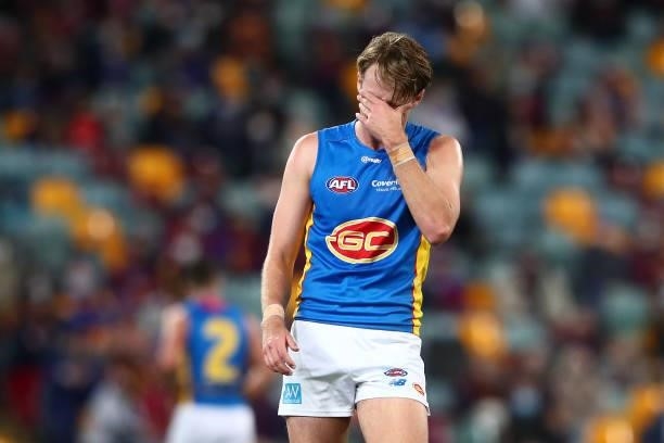 Jack Lukosius of the Suns reacts during the round 20 AFL match between Brisbane Lions and Gold Coast Suns at The Gabba on July 24, 2021 in Brisbane,...