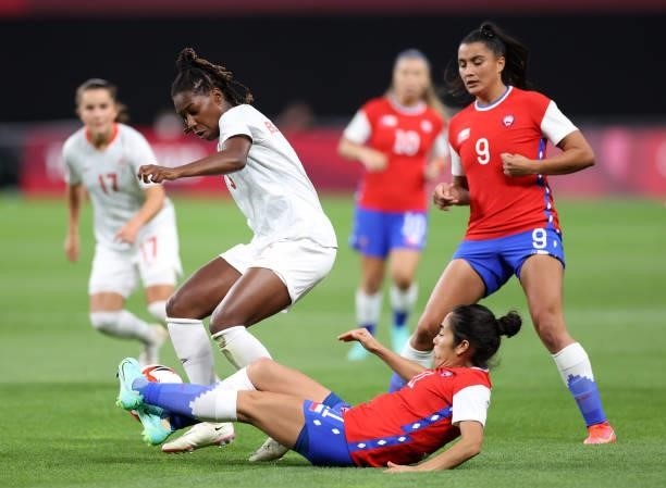 Kadeisha Buchanan of Team Canada is challenged by Yessenia Lopez of Team Chile during the Women's First Round Group E match between Chile and Canada...