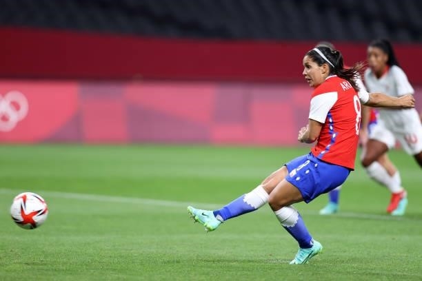 Karen Araya of Team Chile scores their side's first goal from the penalty spot during the Women's First Round Group E match between Chile and Canada...