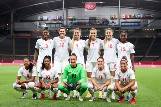 Players of Team Canada pose for a team photograph prior to the Women's First Round Group E match between Chile and Canada on day one of the Tokyo...