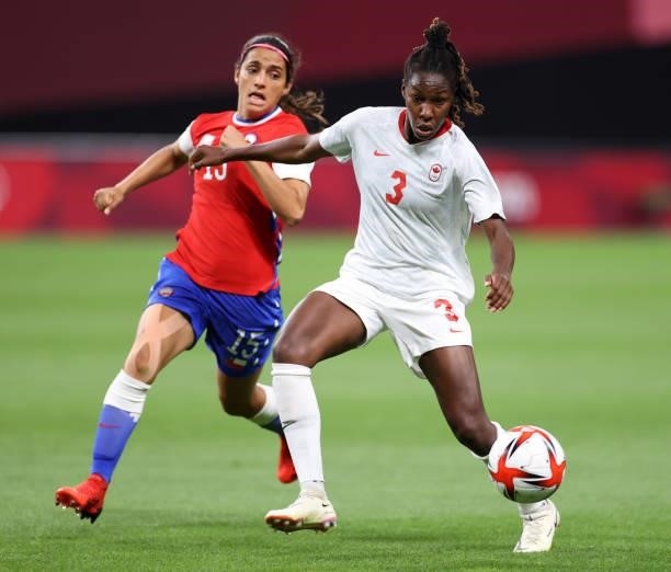 Kadeisha Buchanan of Team Canada holds off Daniela Zamora of Team Chile during the Women's First Round Group E match between Chile and Canada on day...