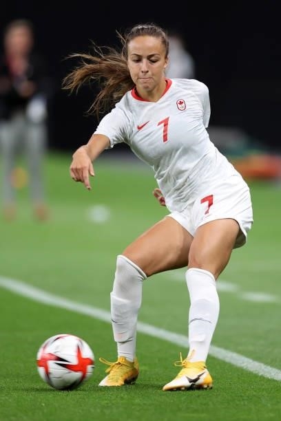 Julia Grosso of Team Canada passes the ball during the Women's First Round Group E match between Chile and Canada on day one of the Tokyo 2020...