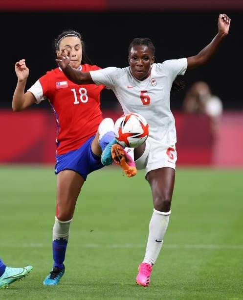 Deanne Rose of Team Canada battles for possession with Camila Saez of Team Chile during the Women's First Round Group E match between Chile and...