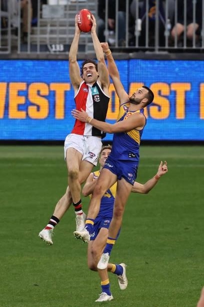 Max King of the Saints marks the ball against Josh Rotham of the Eagles during the round 19 AFL match between West Coast Eagles and St Kilda Saints...