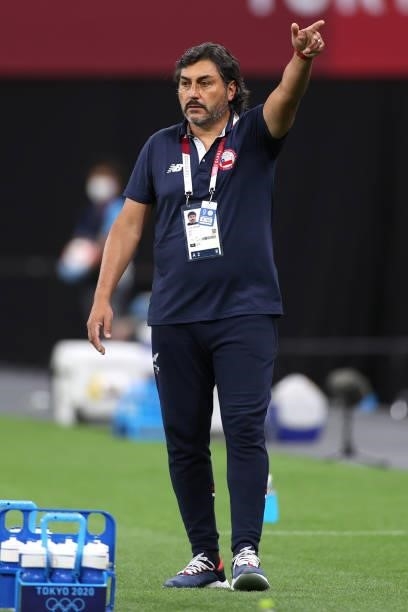 Jose Letelier, Head Coach of Team Chile gives instructions during the Women's First Round Group E match between Chile and Canada on day one of the...