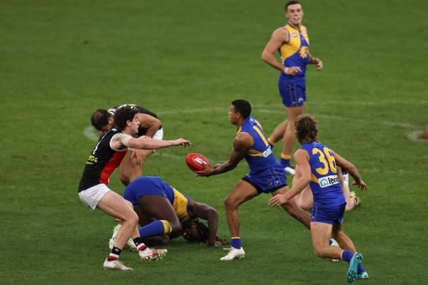 Tim Kelly of the Eagles looks to handball during the round 19 AFL match between West Coast Eagles and St Kilda Saints at Optus Stadium on July 24,...
