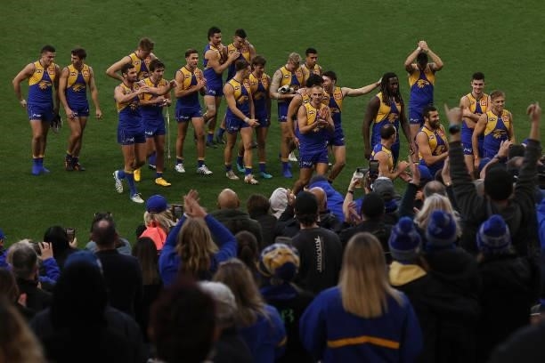 The Eagles walk from the field after winning the round 19 AFL match between West Coast Eagles and St Kilda Saints at Optus Stadium on July 24, 2021...