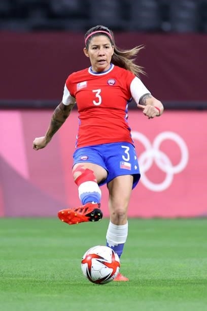 Carla Guerrero of Team Chile passes the ball during the Women's First Round Group E match between Chile and Canada on day one of the Tokyo 2020...