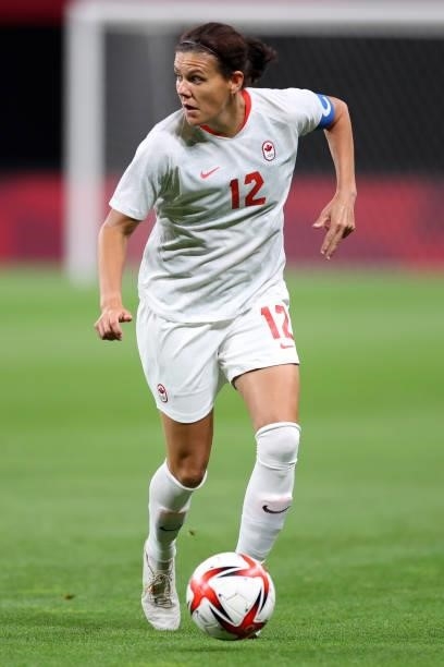 Christine Sinclair of Team Canada runs with the ball during the Women's First Round Group E match between Chile and Canada on day one of the Tokyo...