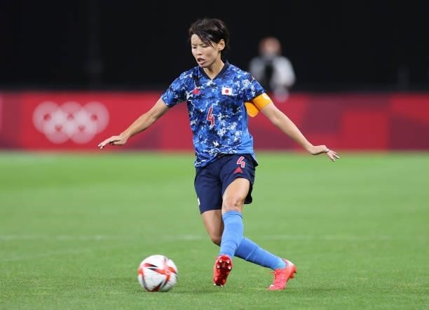 Saki Kumagai of Team Japan passes the ball during the Women's First Round Group E match between Japan and Great Britain on day one of the Tokyo 2020...