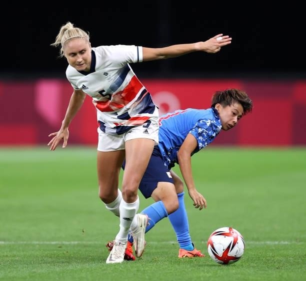 Steph Houghton of Team Great Britain battles for possession with Mina Tanaka of Team Japan during the Women's First Round Group E match between Japan...