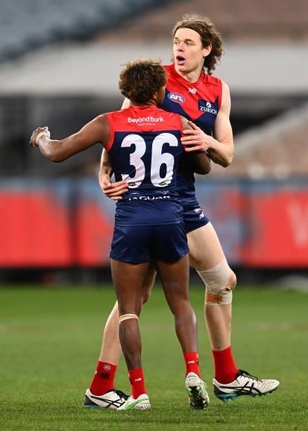 Ben Brown of the Demons is congratulated by Kysaiah Pickett after kicking a goal during the round 20 AFL match between Melbourne Demons and Western...