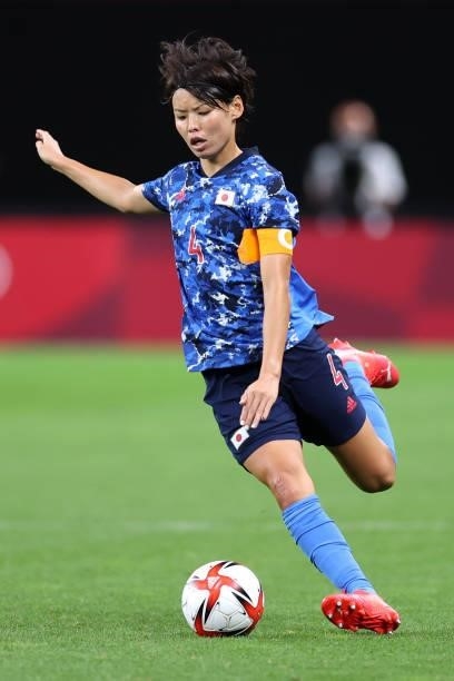 Saki Kumagai of Team Japan on the ball during the Women's First Round Group E match between Japan and Great Britain on day one of the Tokyo 2020...