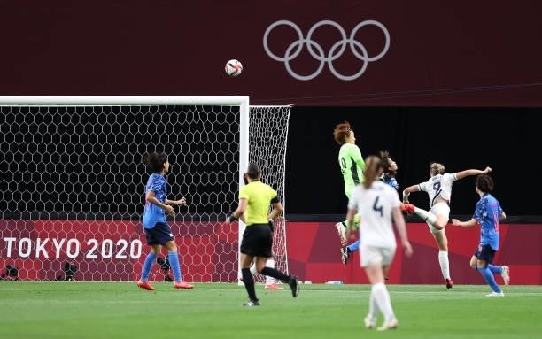 Ellen White of Team Great Britain scores their side's first goal past Ayaka Yamashita of Team Japan during the Women's First Round Group E match...