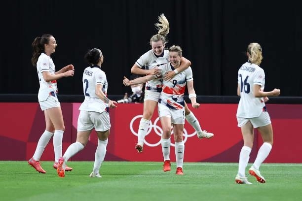 Ellen White of Team Great Britain celebrates with teammates Lauren Hemp, Lucy Bronze and Caroline Weir after scoring their side's first goal during...
