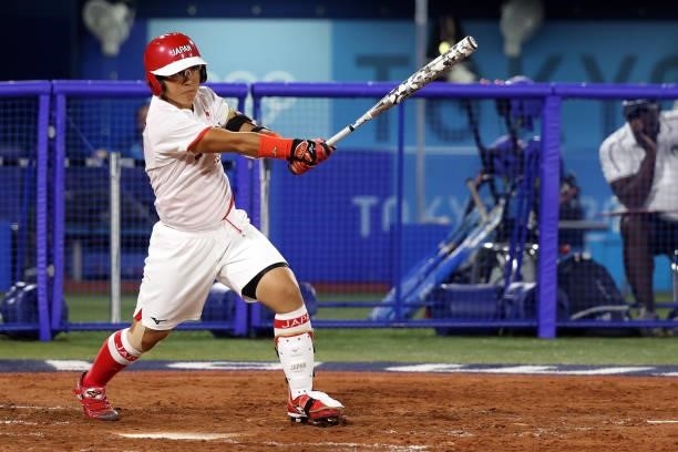 Yu Yamamoto of Team Japan hits a two-run home run in the fourth inning against Team Italy during the Softball Opening Round on day one of the Tokyo...