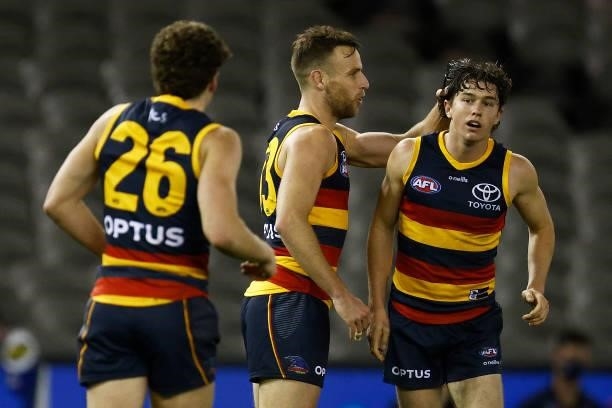 Ned McHenry of the Crows celebrates a goal during the round 20 AFL match between Adelaide Crows and Hawthorn Hawks at Marvel Stadium on July 24, 2021...