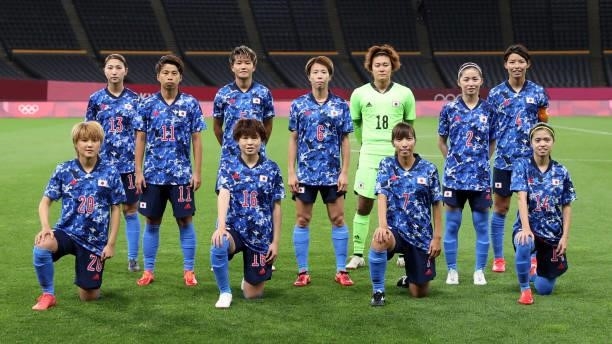 Players of Team Japan pose for a team photograph prior to the Women's First Round Group E match between Japan and Great Britain on day one of the...