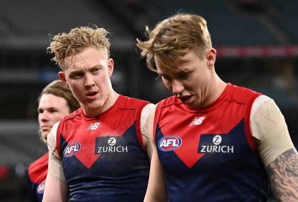 Clayton Oliver and James Harmes of the Demons look dejected after losing the round 20 AFL match between Melbourne Demons and Western Bulldogs at...