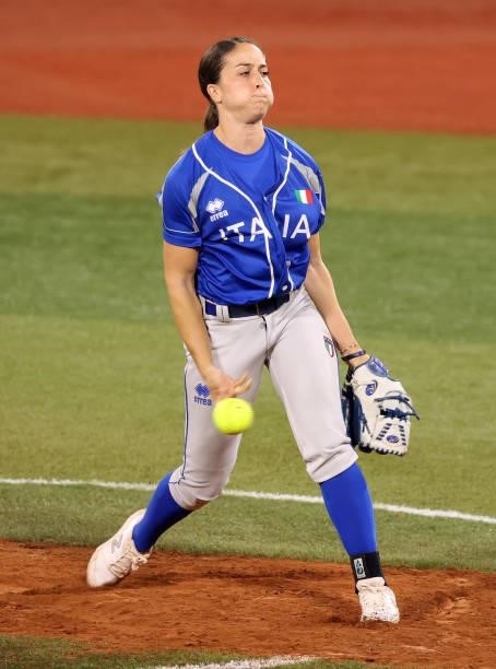 Ilaria Cacciamani of Team Italy pitches in the fifth inning against Team Japan during the Softball Opening Round on day one of the Tokyo 2020 Olympic...