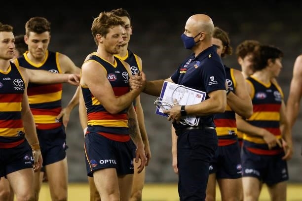 Crows Head coach Matthew Nicks shakes hands with Rory Sloane of the Crows after winning the round 20 AFL match between Adelaide Crows and Hawthorn...