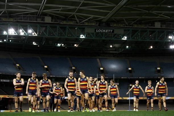 The Crows celebrate victory after the round 20 AFL match between Adelaide Crows and Hawthorn Hawks at Marvel Stadium on July 24, 2021 in Melbourne,...
