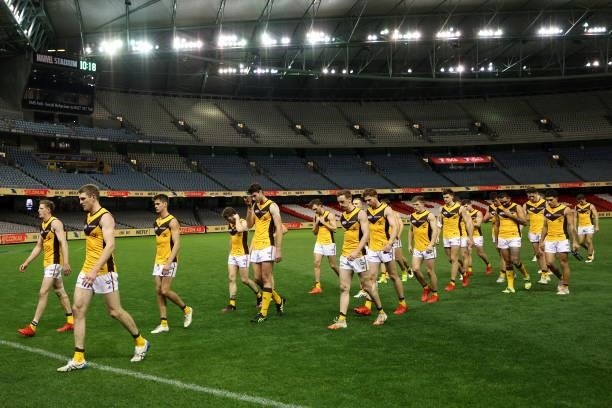 Hawthorn players are seen leaving the arena after their defeat during the round 20 AFL match between Adelaide Crows and Hawthorn Hawks at Marvel...
