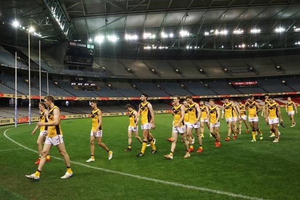 Hawthorn players are seen leaving the arena after their defeat during the round 20 AFL match between Adelaide Crows and Hawthorn Hawks at Marvel...