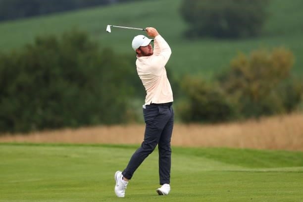 Sam Horsfield of England plays his second shot on the first hole during Day Three of the Cazoo Open supported by Gareth Bale at Celtic Manor Resort...