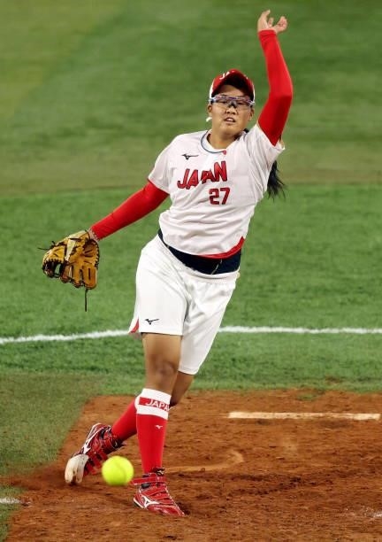 Miu Goto of Team Japan pitches in the fourth inning against Team Italy during the Softball Opening Round on day one of the Tokyo 2020 Olympic Games...