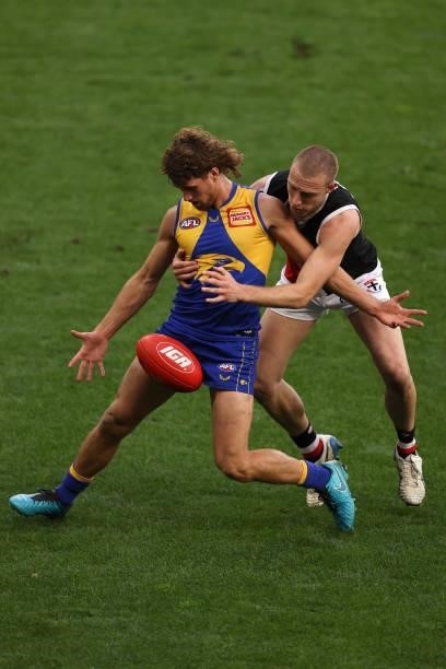 Connor West of the Eagles and Callum Wilkie of the Saints contest for the ball during the round 19 AFL match between West Coast Eagles and St Kilda...