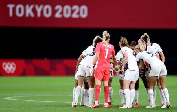 Players of Team Great Britain form a huddle prior to the Women's First Round Group E match between Japan and Great Britain on day one of the Tokyo...