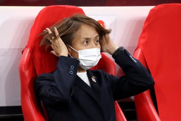 Asako Takakura, Head Coach of Team Japan reacts during the Women's First Round Group E match between Japan and Great Britain on day one of the Tokyo...