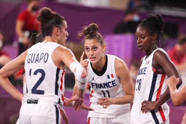 Team France talk in a huddle during the Women's Pool Round match between France and Italy on day one of the Tokyo 2020 Olympic Games at Aomi Urban...